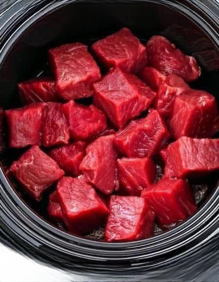 Put raw cubed beef in a slow cooker with these 3 ingredients, You wont believe how good it tastes